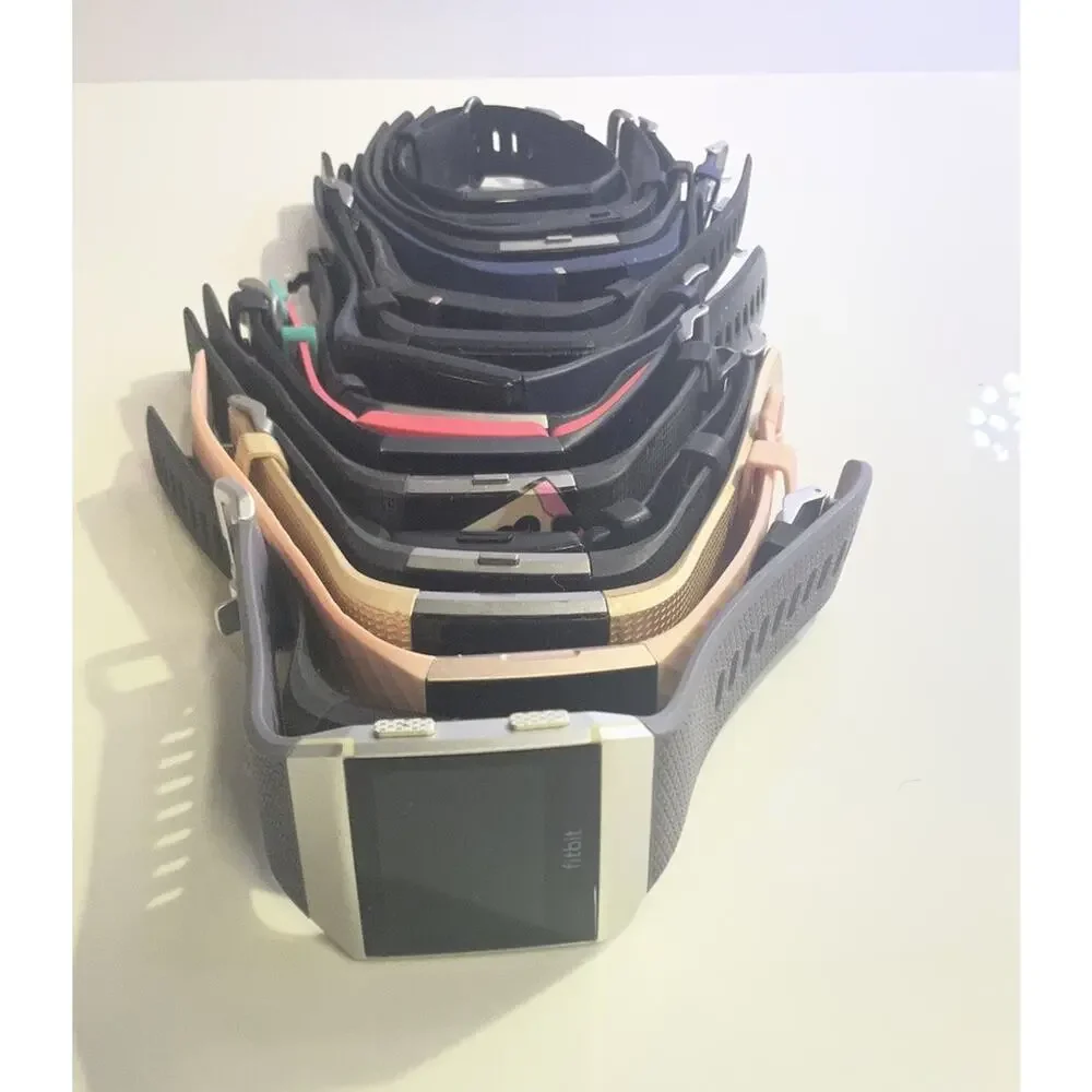 LOT OF 100 + Fitbit Watches Versa Charge Inspire Sense FOR PARTS and REPAIR